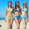 Trio tieners op het strand